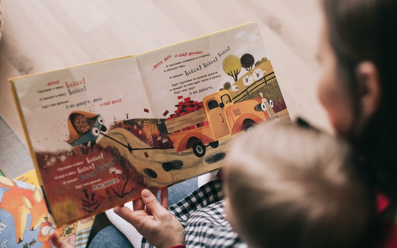 How does Reading help in a child’s development?